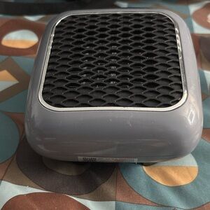 Gray and Black Mesh Speaker with Rounded Corners